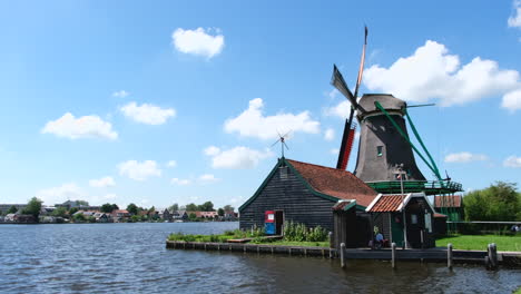 windmills by the water