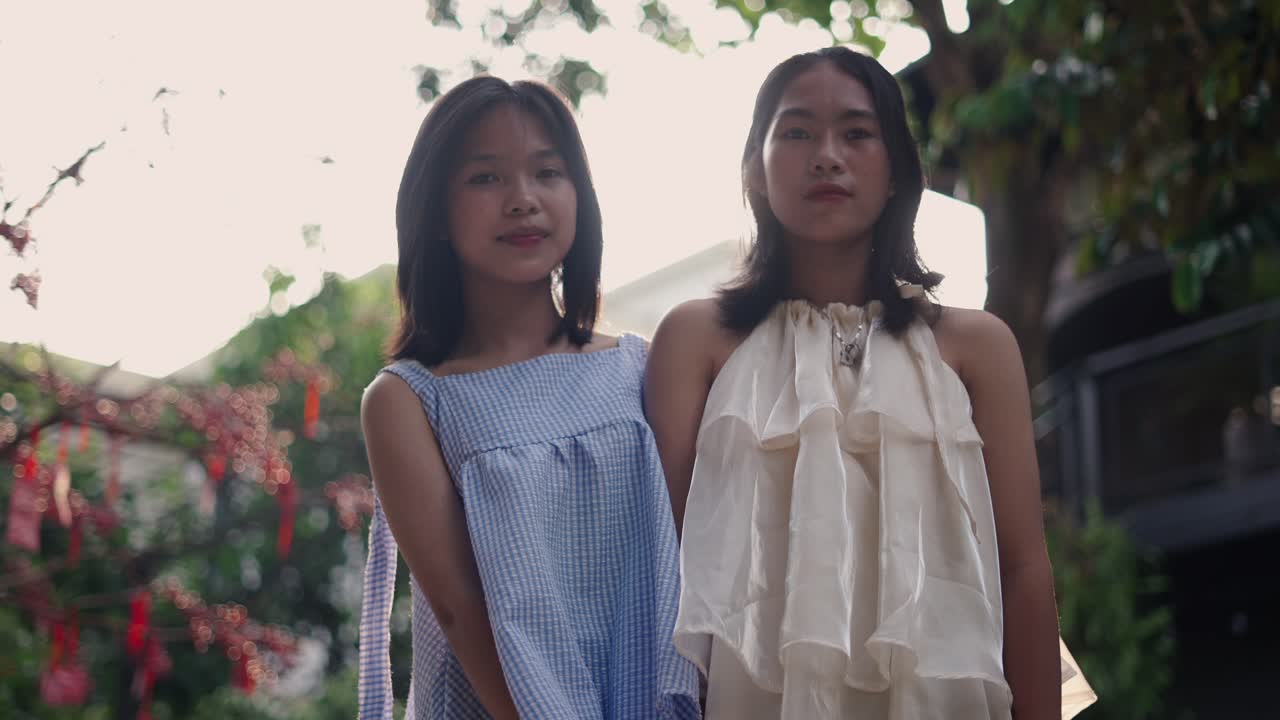Two Teenage Girls Outdoors