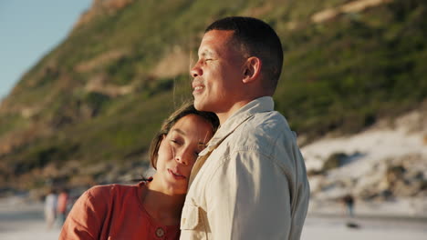 Face,-happy-and-couple-hug-at-beach-on-vacation