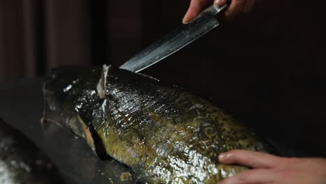 preparing a fish