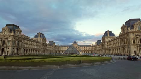 louvre museum, paris, france at sunset