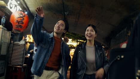 couple exploring a night market