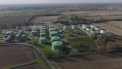 Aerial-view-of-steel-round-Oil-Storage-Tanks,-storage-and-handling-services-for-petroleum-products