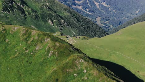 View-from-the-high-track-in-caucasus-mountains-glaciers,-green-grass,-wild-lakes