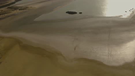 Aerial-shot-tilting-up-to-beautiful-Landscape-of-Punta-Gallinas,-Colombia