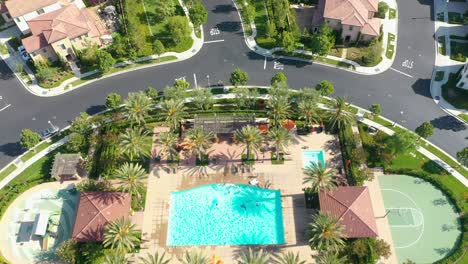 low fly over a new residential community in irvine, california with an amazing private recreational park