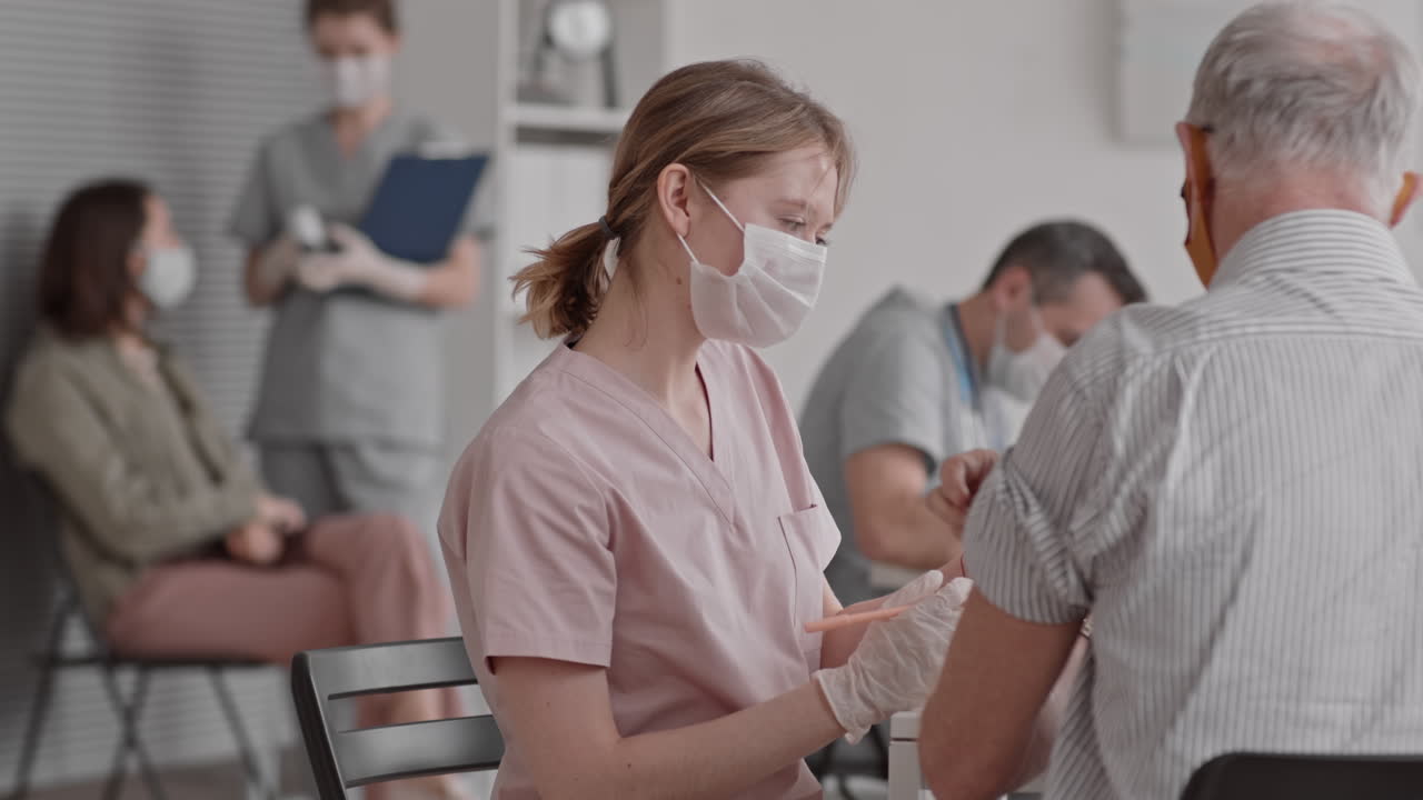 Blonde Doctor Working after Vaccination