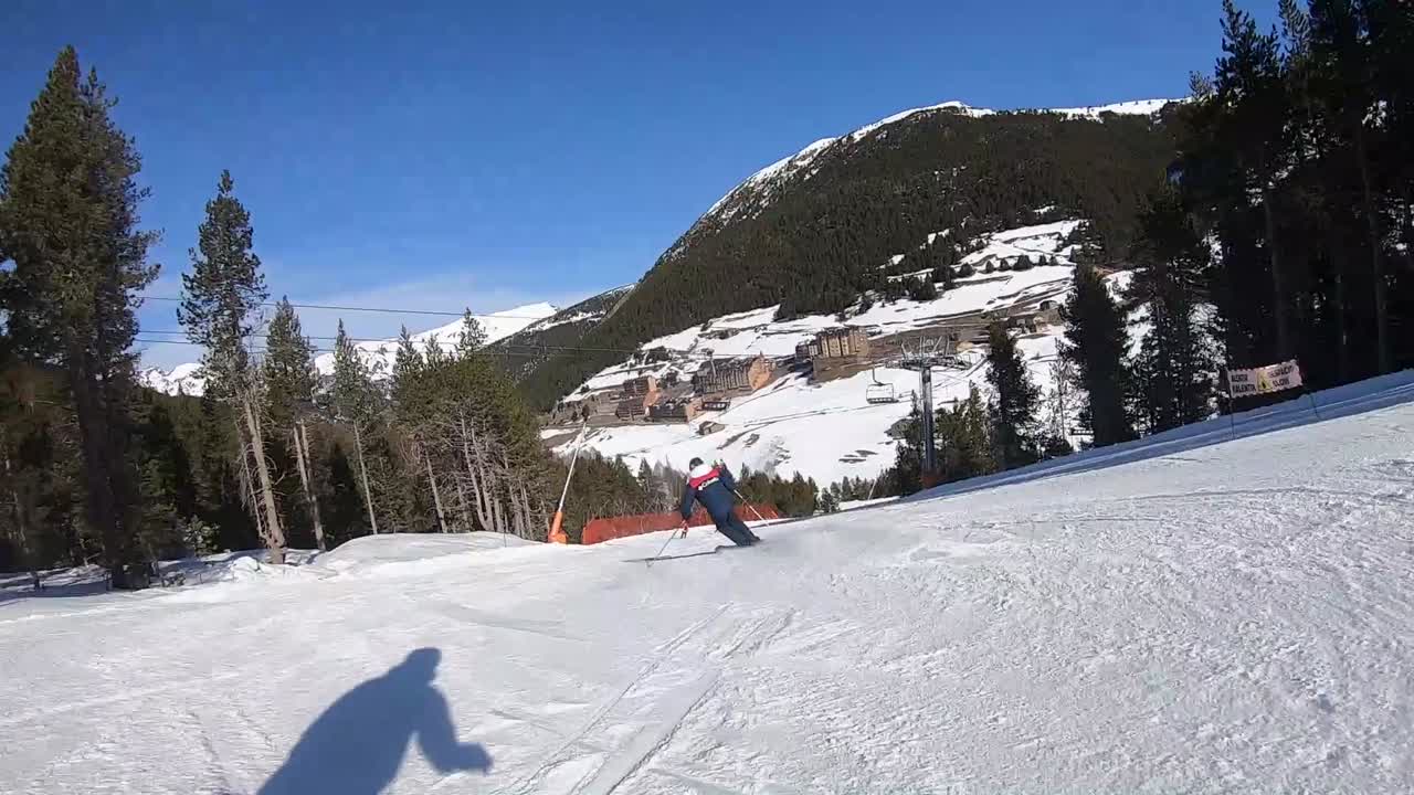 Skier skates on ice and falls at a station in Andorra
