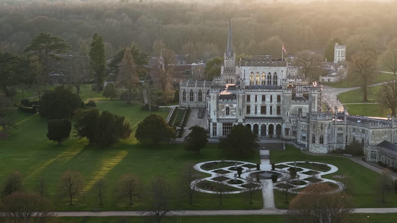 Aerial view of historic Ashridge House in Hertfordshire at sunset
