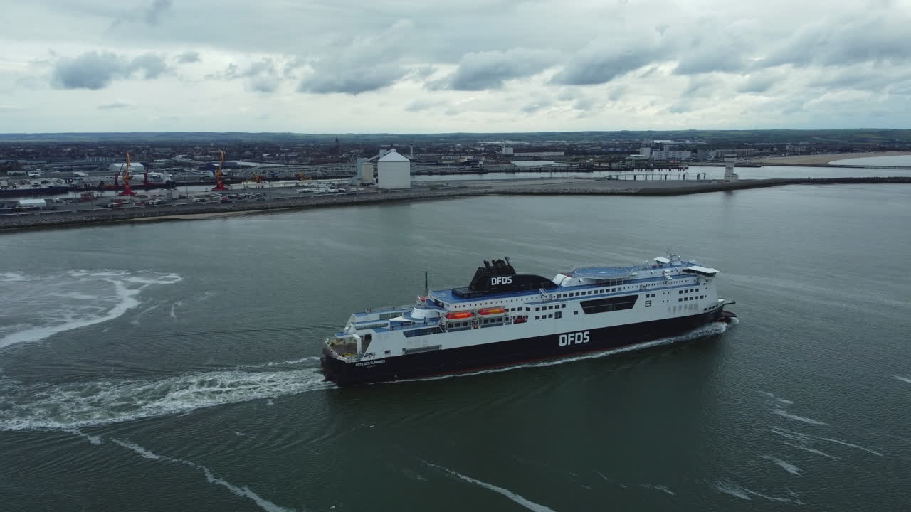 Ferry departing from a port, aerial view