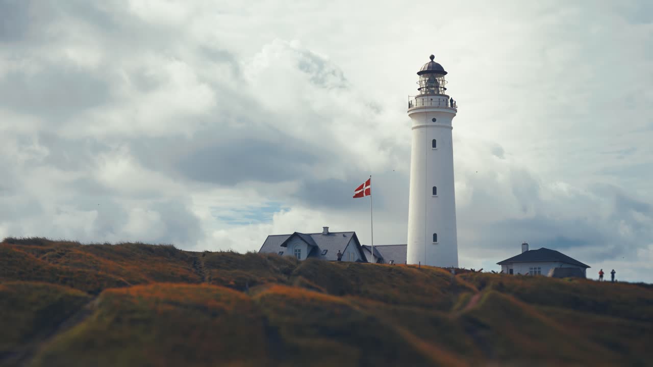 Stormy clouds roll above the lighthouse in Hirtshals on the Danish coast