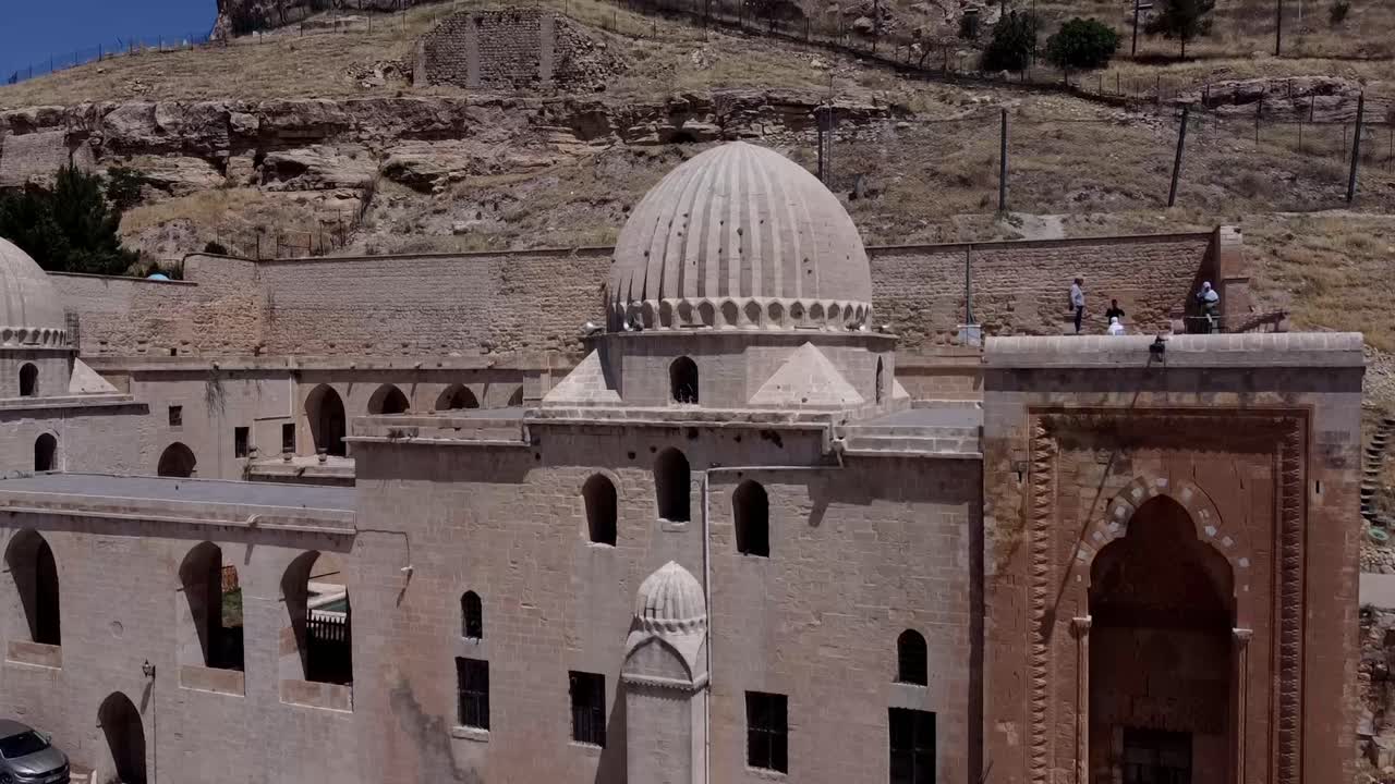 Mardin, Turkey, Cinematic Places and People Activities - Street View -  The Zinciriye Madrasa, Bottom Top view