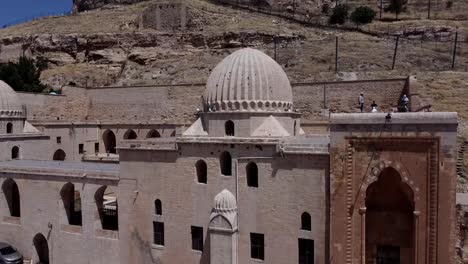 mardin, turkey, cinematic places and people activities - street view -  the zinciriye madrasa, bottom top view