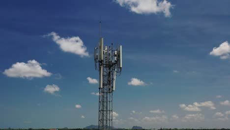 closeup aerial view around of the telecommunications tower.