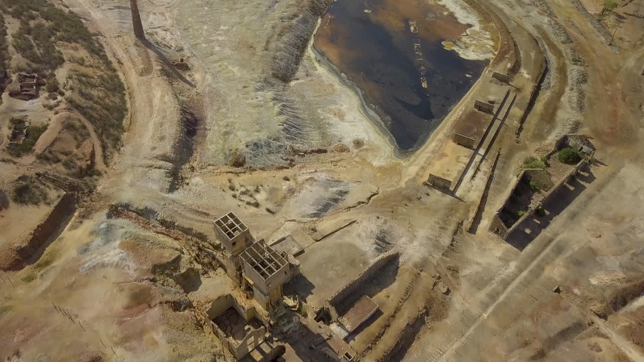 The São Domingos Mine by drone, a deserted open-pit mine in Corte do Pinto, Alentejo, Portugal