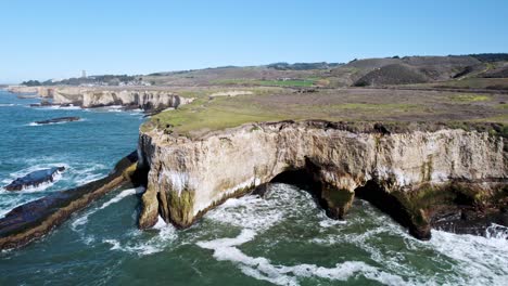 Dramatic Ocean Cliffs on the West Coast with Waves Crashing Against Rocks