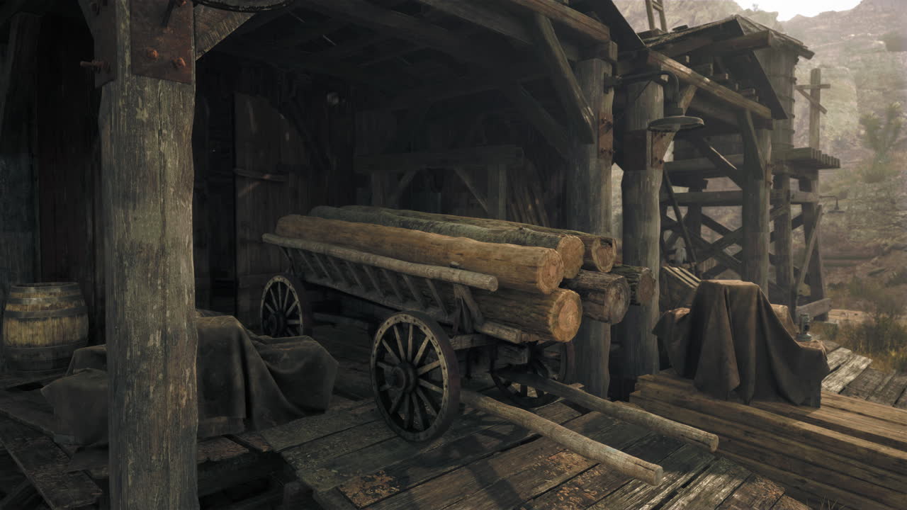 오래된 창고 밖에 주차된 나무를 가진 시골 목조 카트.