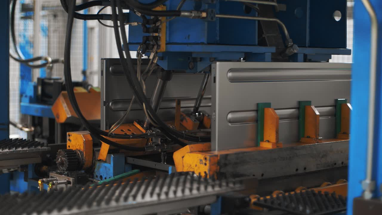 Automatic equipment assembling washing machine from metal part at plant