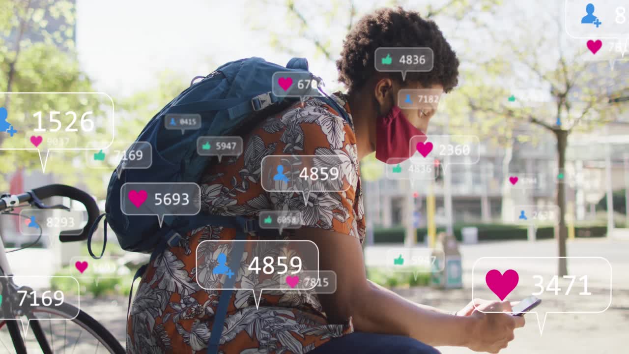 animación de iconos de los medios sobre un hombre afroamericano que usa un teléfono inteligente