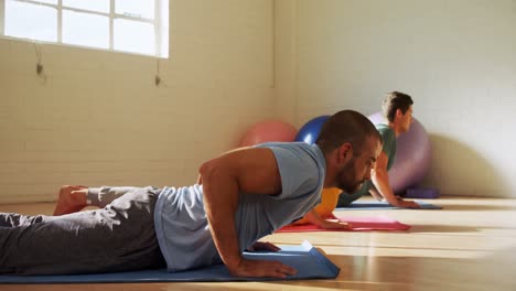 Group-of-people-doing-yoga-4k