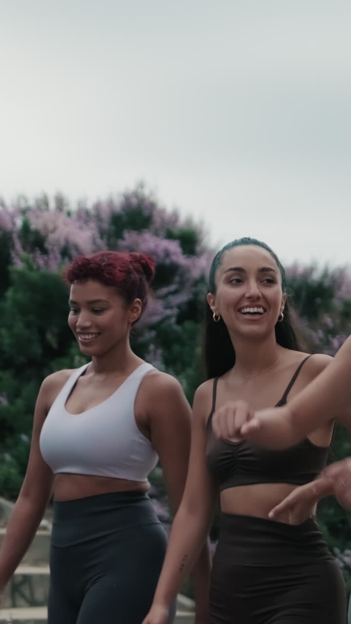 Friends Laughing Together After Beach Workout