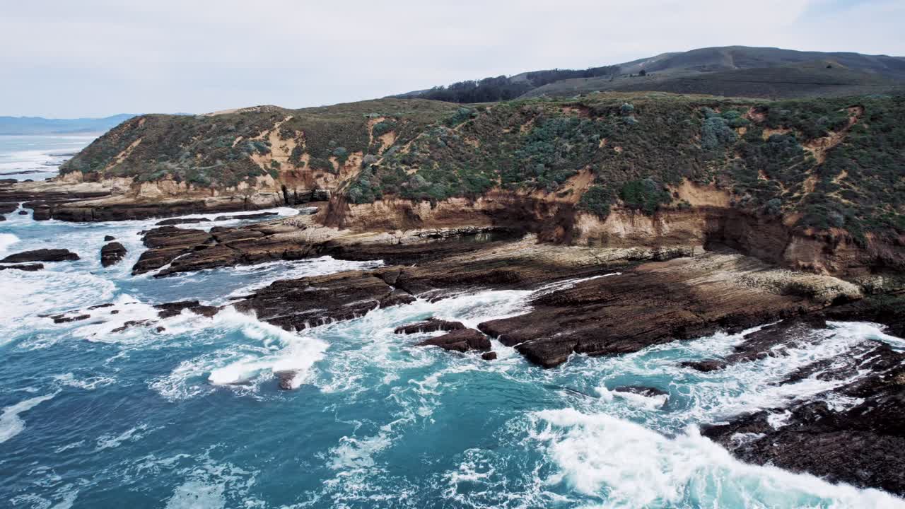 Dramatic Ocean Cliffs on the West Coast with Waves Crashing Against Rocks