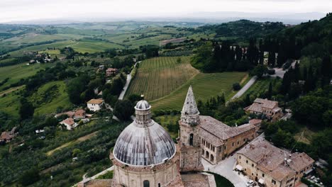 Aerial-view-of-the-Sanctuary-of-the-Madonna-di-San-Biagio-in-Italy's-countryside