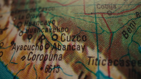close-up of a vintage map, focused on the cusco region of peru.