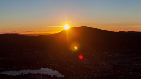 sun sets behind the mountains timelapse