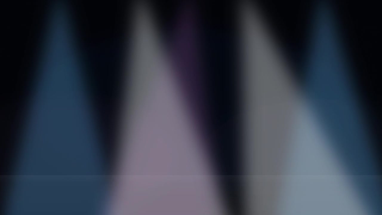 Abstract Background with Moving Colorful Stage Spotlights