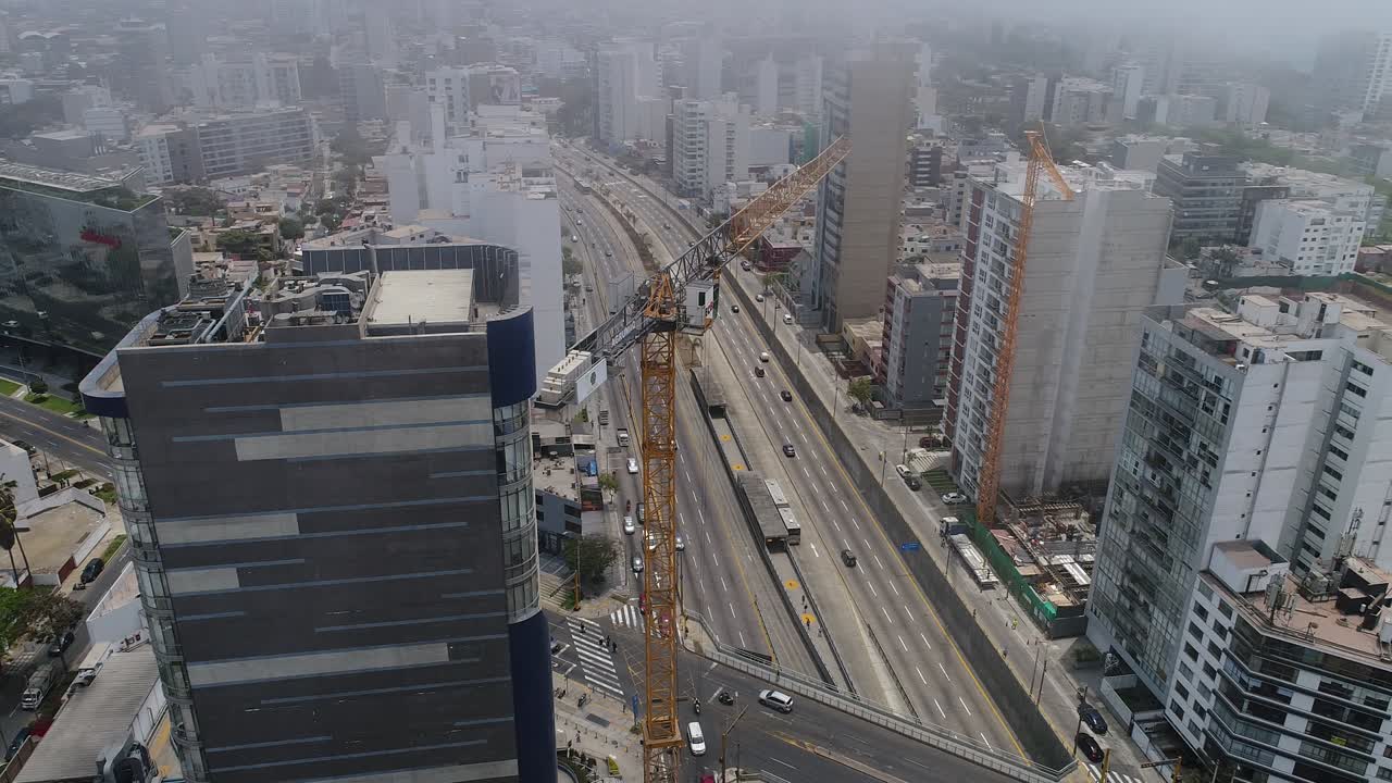 Lima, Lima . Peru - November 19th 2020: Aerial video of Lima Peru. Principal highway  with constructions projects. Main city of Peru. Capital city.