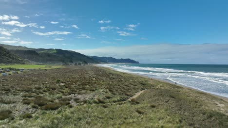 Grass-dunes-at-Ocean-Beach-Hawke's-Bay-in-New-Zealand,-aerial