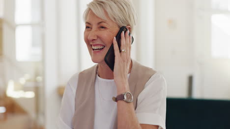 Senior-woman-and-phone-call-at-laptop-in-office