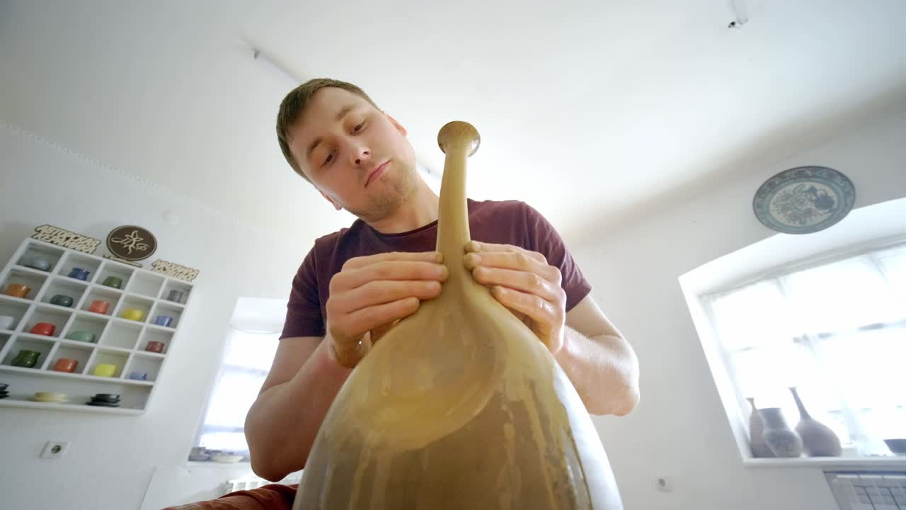 Pottery Artist Shaping a Vase