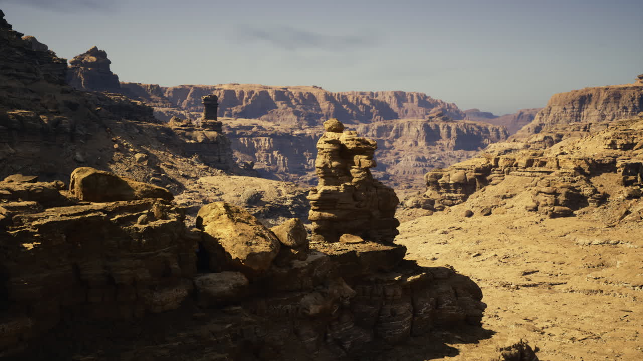 Desert landscape with rocky formations and distant mountains