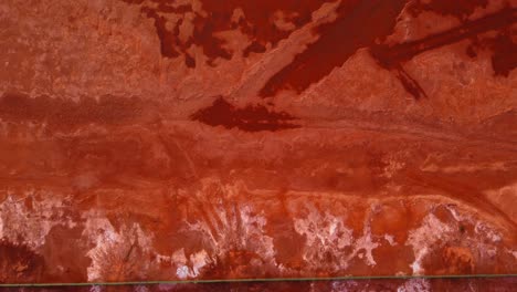 Red-Mud-Bauxite-residue,-top-down-aerial-view-of-toxic-industrial-waste