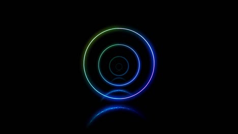 varios círculos de neón uno dentro del otro cambian de color en el fondo negro.