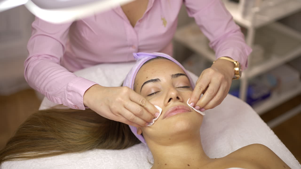 Woman Receiving a Professional Facial Skincare Treatment