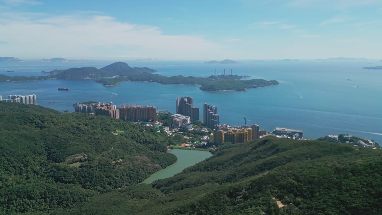 Footage capturing Hong Kong’s mountains meeting the ocean, showcasing scenic coastal hills, greenery, and panoramic sea views, perfect for travel, nature, and outdoor stock visuals