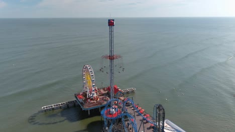 aerial view of pier off the coastal area of galveston island texas