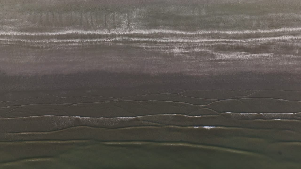 Waves Crashing on The Shore, Aerial Top Down Shot, High Up, Abstract and Peaceful Ocean Waves, Shallow Beach