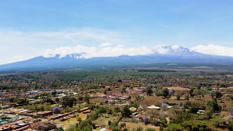 rural village town of kenya with kilimanjaro in the background