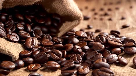 a sack full of coffee beans on a wooden table