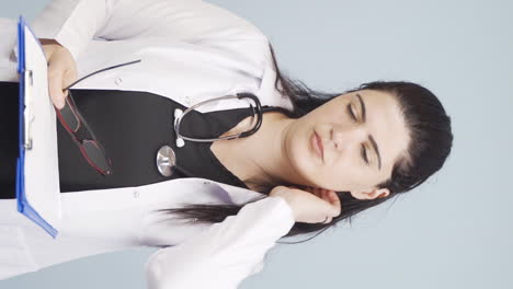 Vertical-video-of-Doctor-with-occupational-fatigue.