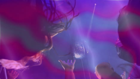 hands reaching toward disco ball creating vibrant party scene, with purple pink stage lighting