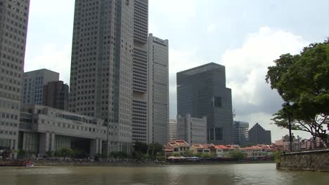 boat tour on singapore river in a sunny day