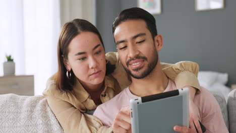 asian young couple with tablet on social media app