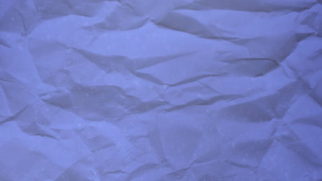 animation of crumpled purple paper moving background