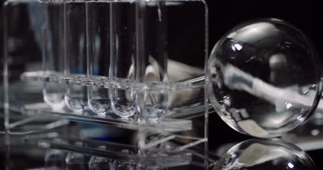 Laboratory-Equipement:-Syringe-And-Medicine-Test-Tubes-And-Flasks-Rotating-On-Black-Background-10