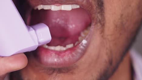 person using inhaler